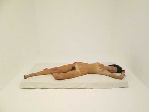 mujer en la cama.jpg